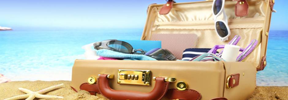 Packed Suit Case on the beach
