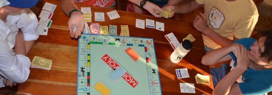 Family playing Monopoly 