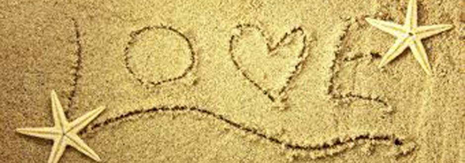 Love written in beach sand - Sanibel