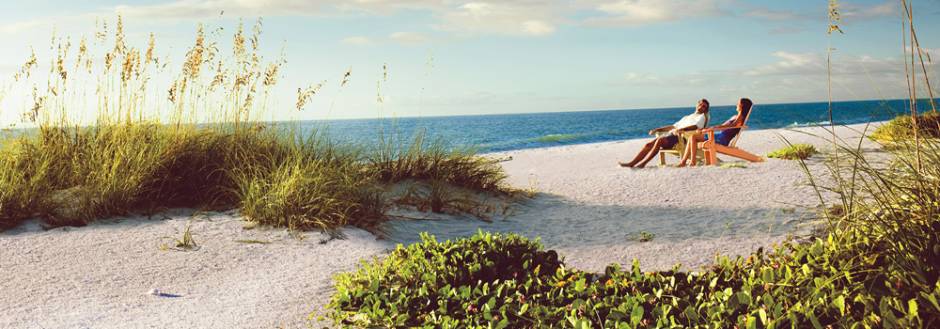 Couple Sitting on Beach 