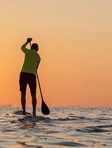 Person on Stand Up Paddle Board